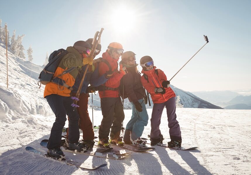 1739612605-group-skiers-taking-selfie-mobile-phone.jpg