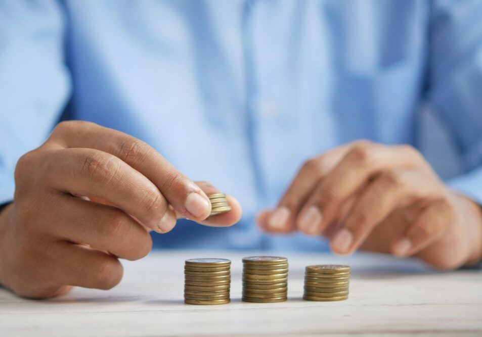 man counting money, cover image for emergency fund